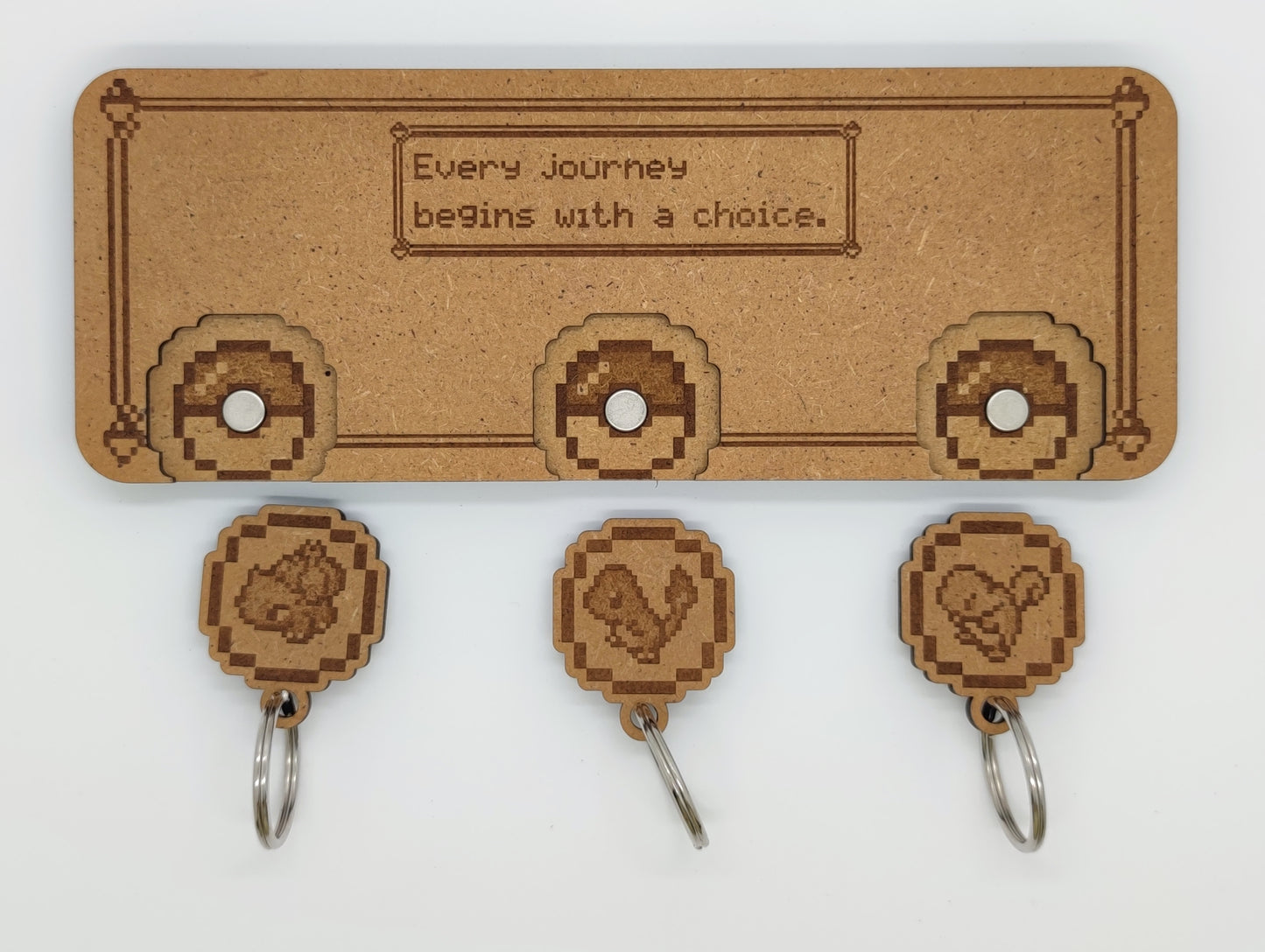 Trois Porte-clef et support mural - Pokemon "Every journey begins with a choice"