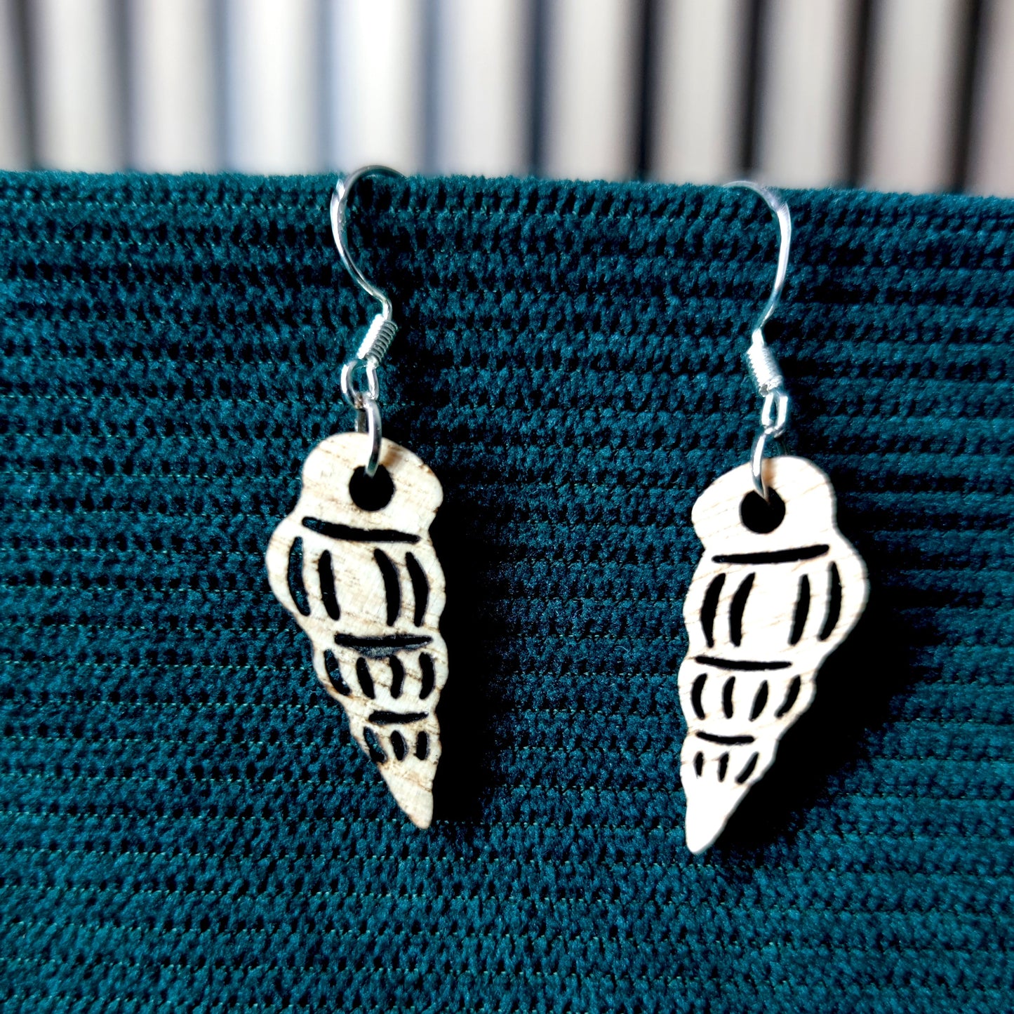 photo boucle oreille blanche