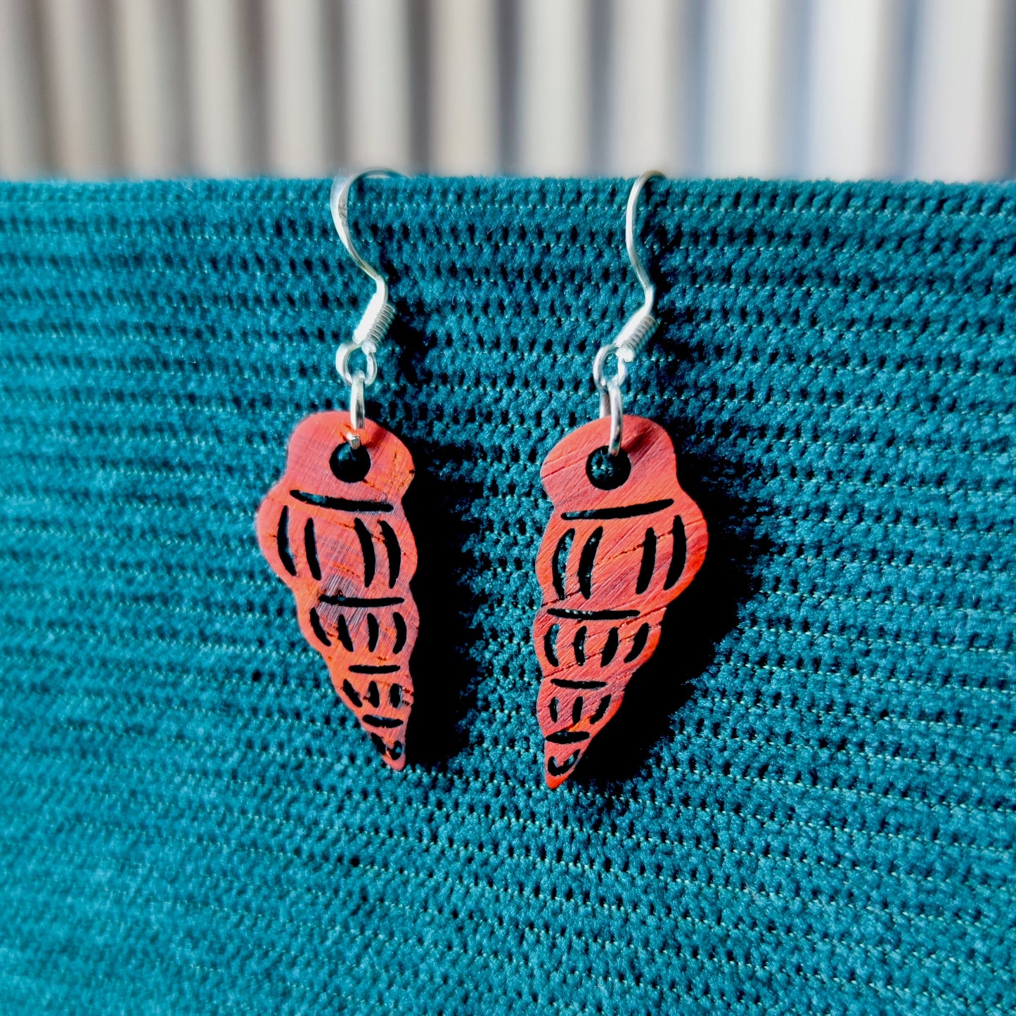photo boucle oreille coquillage rouge